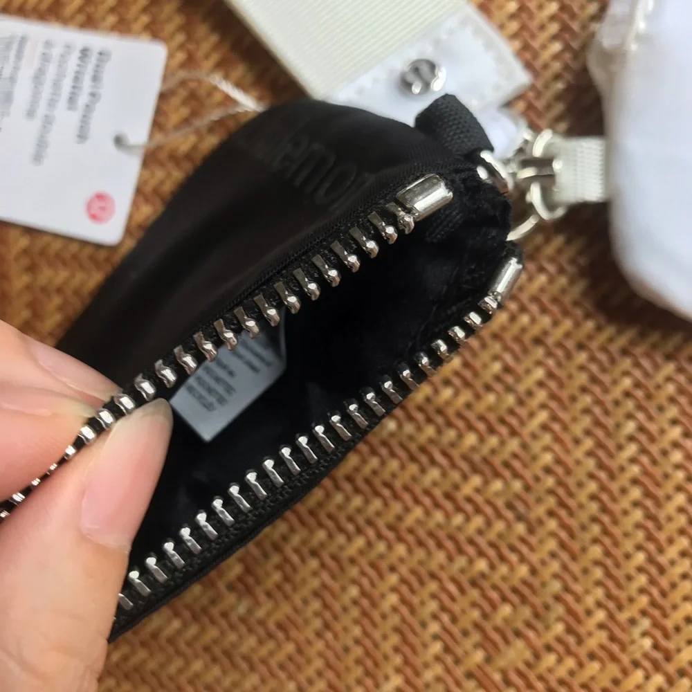 lululemon athletica White Strap with Black and White Key Pouches